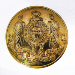 25-5.1.1 Coats of arms only (must have family shield) - achievement shield, motto on border, two orders of distinction, Helm of rank, supporters, family motto on banner with more distinctions - gilded brass - 1 & 3/16"