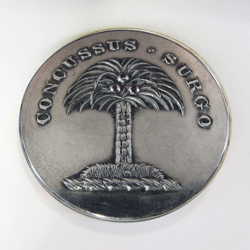 25-5.2.2.3 Plants (corresponds to Sec. 19 - Trees) Palm tree surmounting a torse with family motto - silver-plated copper - 1"