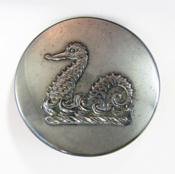25-5.2.2.4 Other pictorials (corresponds to Sec. 20 - Mythological) - Sea Monster (Lochness?) on water surmounting a torse - silver-plated copper - 1"